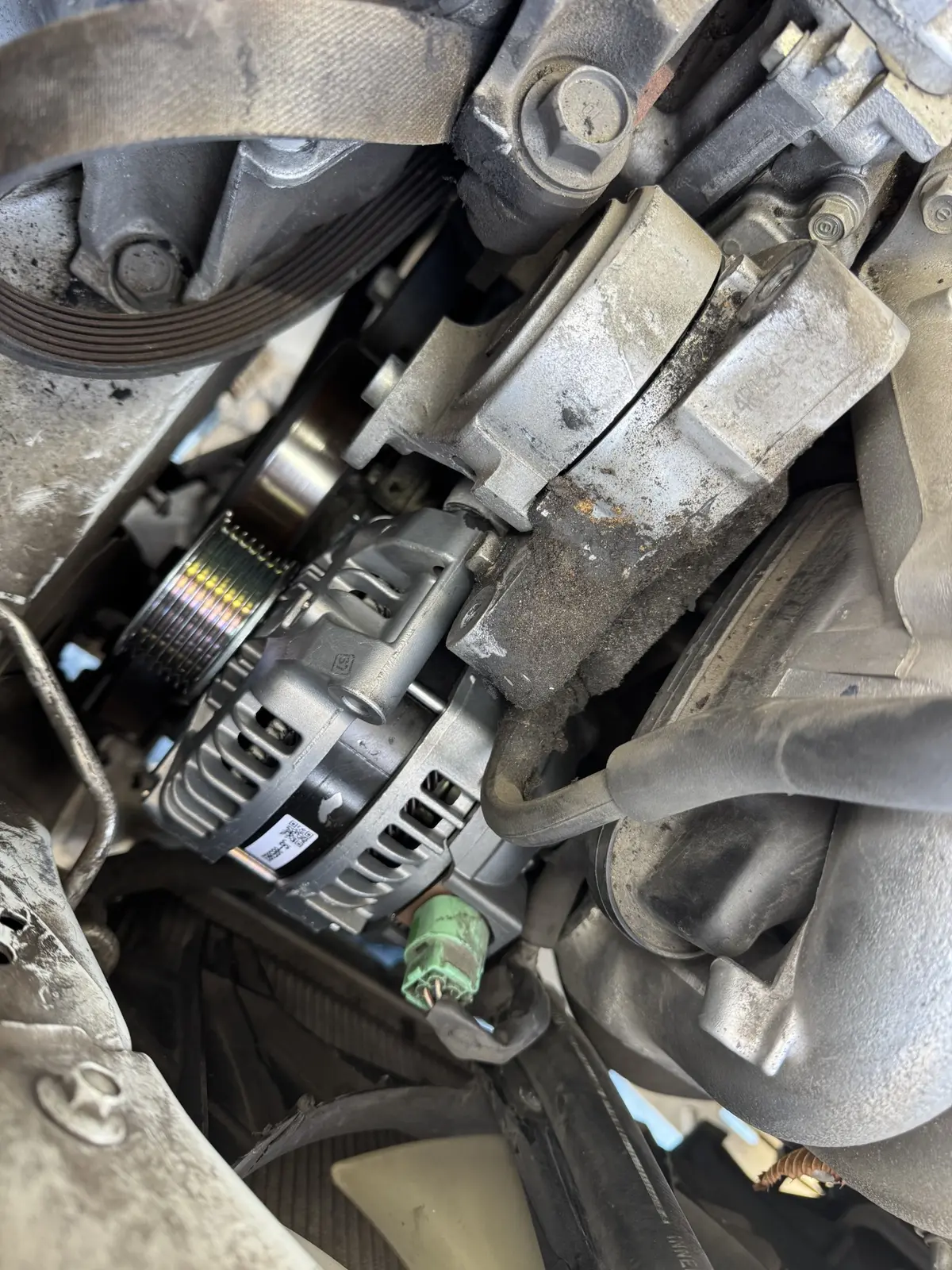 Replacement alternator installed in a 2009 Honda CR-V.